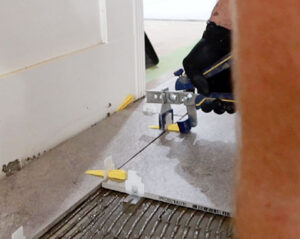 installing tile leveling spacers DIY tiling tips